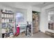Functional storage space with shelving, a refrigerator, and a utility area with natural light at 1032 Windward Rd, Charleston, SC 29412