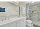 Modern bathroom with a double sink vanity, marble shower, and updated fixtures at 104 Lancaster Ct, Goose Creek, SC 29445