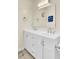 Bright bathroom with a white double vanity, large mirror, and clean design at 104 Lancaster Ct, Goose Creek, SC 29445