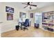 Bright bedroom featuring bamboo floors, ceiling fan, and a window, creating a cozy and inviting atmosphere at 104 Lancaster Ct, Goose Creek, SC 29445