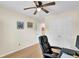 The bedroom features a ceiling fan, closet, and a chair in front of a desk with computer at 104 Lancaster Ct, Goose Creek, SC 29445