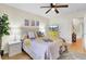 Relaxing bedroom featuring decorative lamps, art pieces, and a view to the hall at 104 Lancaster Ct, Goose Creek, SC 29445