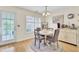 Cozy breakfast nook featuring a round table, natural light, and stylish decor at 104 Lancaster Ct, Goose Creek, SC 29445