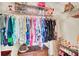 Well-organized walk-in closet with clothing racks, shelving, and ample storage space at 104 Lancaster Ct, Goose Creek, SC 29445
