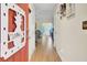 Inviting entryway with hardwood floors, leading into the living area with neutral décor at 104 Lancaster Ct, Goose Creek, SC 29445