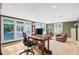 Spacious office featuring ample natural light, wood floors, and a functional workspace at 108 E Walker Dr, Summerville, SC 29483