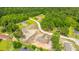 New construction home with a graded lot, ready for landscaping in a serene, wooded neighborhood at 108 Wisteria Falls Ln, Saint Stephen, SC 29479
