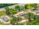 Aerial view of the home on a large lot with trees on the perimeter at 108 Wisteria Falls Ln, Saint Stephen, SC 29479