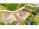 New construction home with a graded lot, ready for landscaping in a serene, wooded neighborhood at 108 Wisteria Falls Ln, Saint Stephen, SC 29479