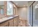 Bathroom featuring a double sink vanity, wood-style flooring, and a modern shower at 108 Wisteria Falls Ln, Saint Stephen, SC 29479