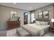 Bedroom with wood-look accent wall, and closet at 108 Wisteria Falls Ln, Saint Stephen, SC 29479