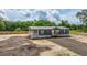 Charming single-story home with a covered porch and neat landscaping at 108 Wisteria Falls Ln, Saint Stephen, SC 29479