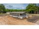 Well-maintained single-story home featuring a cozy front porch at 108 Wisteria Falls Ln, Saint Stephen, SC 29479
