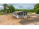 Charming single-story home with a welcoming front porch and landscaped surroundings at 108 Wisteria Falls Ln, Saint Stephen, SC 29479