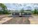 Inviting single-story home with a covered porch and neat landscaping at 108 Wisteria Falls Ln, Saint Stephen, SC 29479