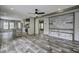 Open floor plan with wood flooring, island kitchen, and stylish decor at 108 Wisteria Falls Ln, Saint Stephen, SC 29479