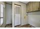Utility room with cabinets, a door, and visible mechanicals at 108 Wisteria Falls Ln, Saint Stephen, SC 29479