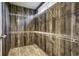 Walk-in closet with wooden wall and adjustable wire shelving at 108 Wisteria Falls Ln, Saint Stephen, SC 29479