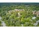 Expansive aerial view of a community surrounded by dense trees, highlighting the proximity to local facilities at 110 W 2Nd South St, Summerville, SC 29483