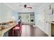 Bonus room features hardwood floors, built-in shelving, and a craft table at 110 W 2Nd South St, Summerville, SC 29483