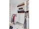 Organized walk-in closet with shelving, drawers, and hanging space for clothes and storage boxes at 110 W 2Nd South St, Summerville, SC 29483