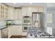 Gourmet kitchen with a large island, modern appliances, and stylish cabinetry at 110 W 2Nd South St, Summerville, SC 29483
