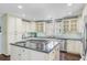 Gourmet kitchen with a large island, modern appliances, and stylish cabinetry at 110 W 2Nd South St, Summerville, SC 29483