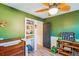 A woodland-themed Bedroom with a bookcase, closet, and olive-green painted walls at 111 Circle Dr, Summerville, SC 29485