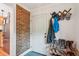 Welcoming entryway featuring exposed brick, coat hooks, and space for shoe storage at 111 Circle Dr, Summerville, SC 29485