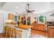 Bright kitchen with butcher block countertops, stainless steel appliances, and a ceiling fan at 111 Circle Dr, Summerville, SC 29485