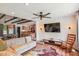 Open-concept living room with hardwood floors, ceiling fan, and seamless flow to the dining area at 111 Circle Dr, Summerville, SC 29485