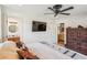 Spacious main bedroom with a ceiling fan and ensuite bathroom with a mounted TV at 111 Circle Dr, Summerville, SC 29485