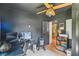 Home office with gray walls, a dark-stained door, and black furniture at 111 Circle Dr, Summerville, SC 29485