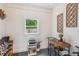 Eclectic sitting area with natural light, rustic decor, and unique design elements at 111 Circle Dr, Summerville, SC 29485