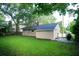 A lush backyard with green grass and mature trees, offering a serene outdoor space at 1137 Dickson Ave, Hanahan, SC 29410