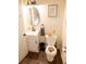 Cozy half bathroom featuring a modern vanity, updated fixtures, and a decorative print at 1137 Dickson Ave, Hanahan, SC 29410