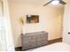 Stylish bedroom featuring a dresser and tv with neutral paint and decor at 1137 Dickson Ave, Hanahan, SC 29410