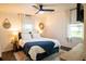 A cozy bedroom featuring a ceiling fan, bedside tables, and a comfortable bed with plush pillows at 1137 Dickson Ave, Hanahan, SC 29410