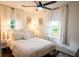 Serene bedroom featuring a comfortable bed, natural light, and stylish decor at 1137 Dickson Ave, Hanahan, SC 29410