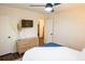 A bright bedroom showcasing a dresser, closet, and open doorway, complemented by modern decor at 1137 Dickson Ave, Hanahan, SC 29410
