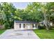 Charming single-story home featuring a well-maintained lawn and a long driveway for ample parking at 1137 Dickson Ave, Hanahan, SC 29410
