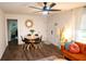Inviting living room with a dining area featuring hardwood floors, stylish seating, and modern decorations at 1137 Dickson Ave, Hanahan, SC 29410