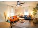 Bright living room featuring hardwood floors, comfortable seating, and stylish decor creating a welcoming atmosphere at 1137 Dickson Ave, Hanahan, SC 29410