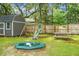 A lovely backyard with a shed, playground, sandbox, and swing, perfect for Gathering fun at 114 Heritage St, Summerville, SC 29485