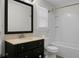 Clean bathroom with a vanity, framed mirror, and a tub/shower combo at 114 Heritage St, Summerville, SC 29485