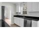 Kitchen with stainless steel appliances, white cabinets, and subway tile backsplash at 114 Heritage St, Summerville, SC 29485
