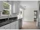 Kitchen featuring stainless steel appliances, gray cabinets, and a sink with a large window view at 114 Heritage St, Summerville, SC 29485