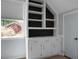 Built-in shelving and cabinets with a window, providing storage and natural light at 114 Heritage St, Summerville, SC 29485