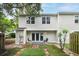 Large backyard with privacy fence, outdoor seating, and artificial turf square at 1161 Monaco Dr, Mount Pleasant, SC 29464