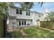 Manicured backyard, with artificial turf, patio, and privacy fence at 1161 Monaco Dr, Mount Pleasant, SC 29464